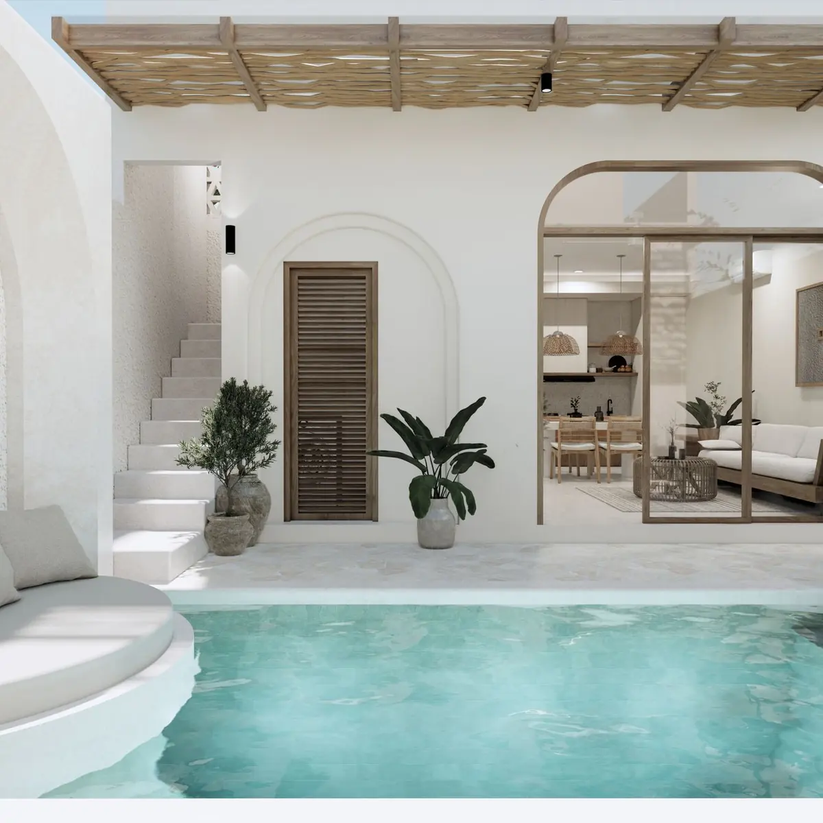 White modern villa with a plunge pool and tropical plants